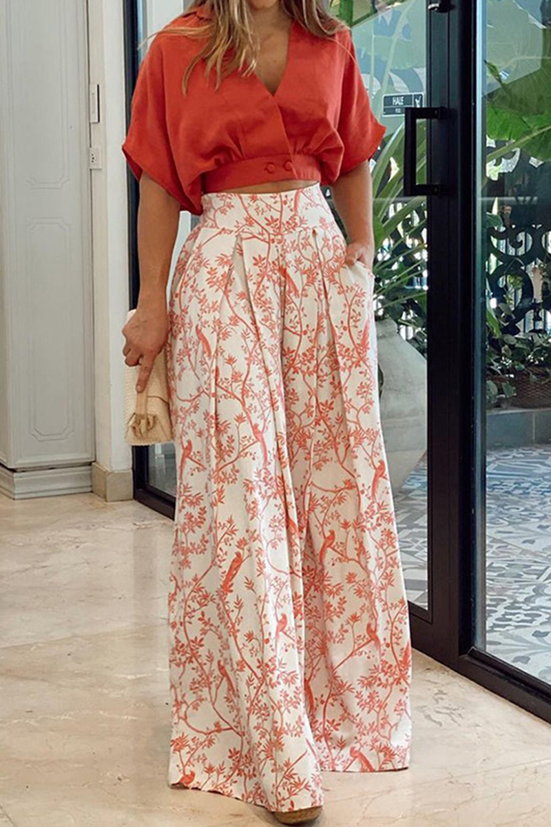 Kallie | Dames set top broek wikkel hals bloemenprint