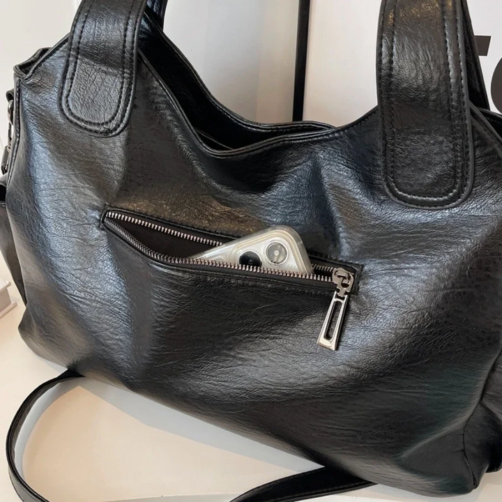 April | Dames schoudertas met ritsvakken handgrepen