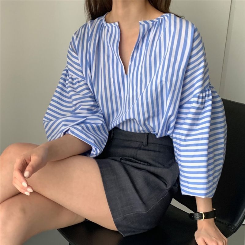 Erin | Damesblouse met split-hals en ballonmouwen