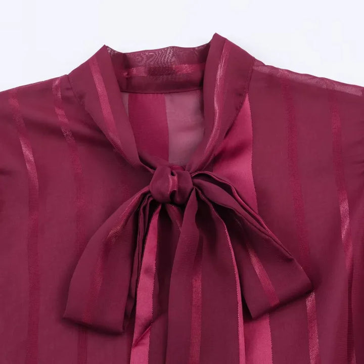 Elodie | Damesblouse met strikhals en ballonmouwen