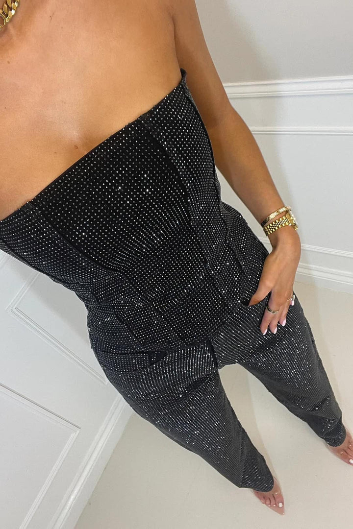Salem | Dames jumpsuit met strapless en glanzende structuur