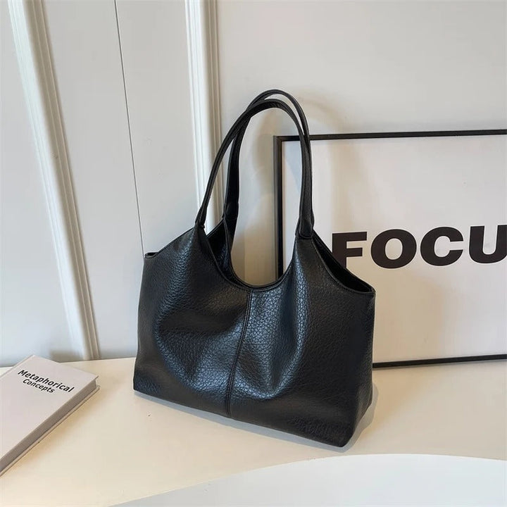 Azalea | Dames schoudertas met open bovenkant brede schouderband