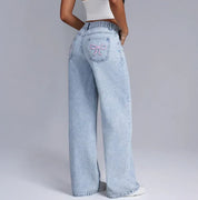 Dahna | Denim Jeans met Wijde Pijpen en Roze Strikdetails