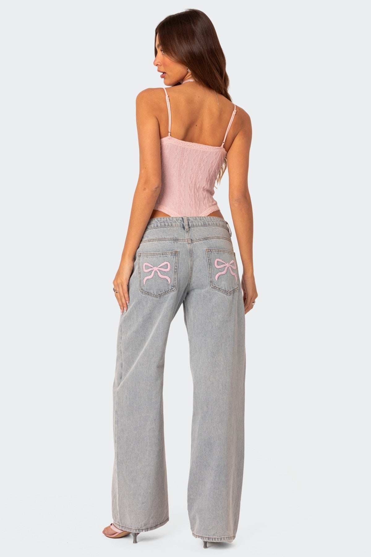 Dahna | Denim Jeans met Wijde Pijpen en Roze Strikdetails