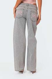 Dahna | Denim Jeans met Wijde Pijpen en Roze Strikdetails