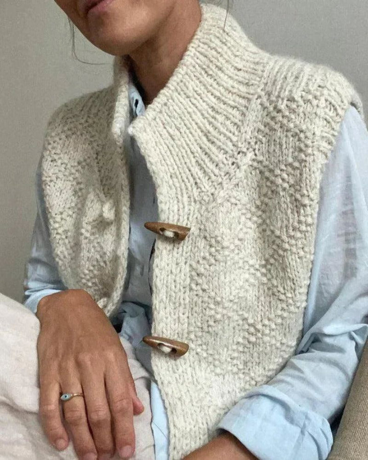 INGRID – GEZELLIGE BREI ZONDER MOUWEN CARDIGAN