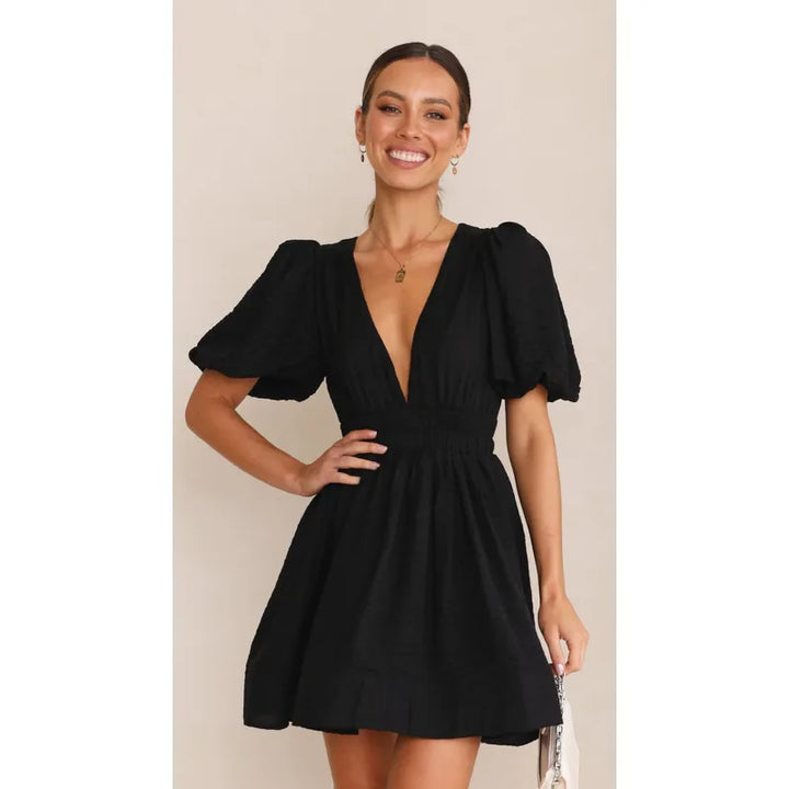 Sara | Dames Mini Jurk met V-hals en pofmouwen