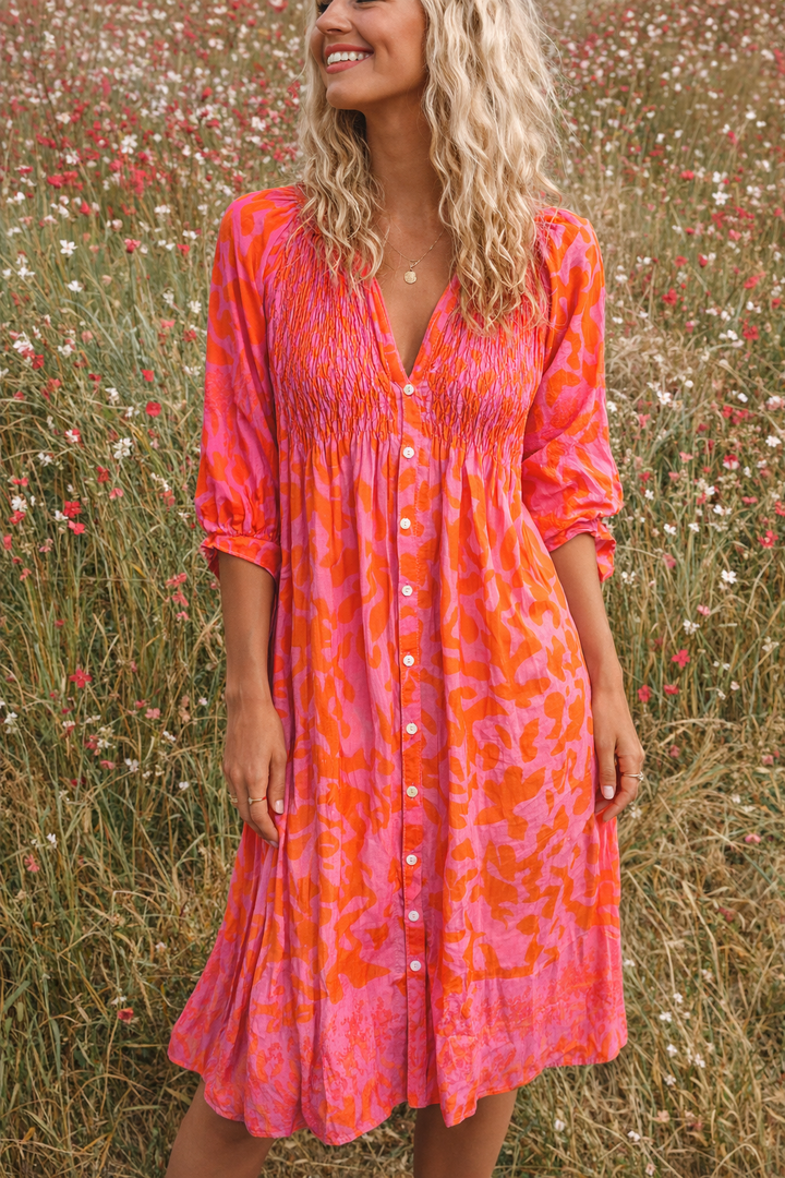 Arely | Dames jurk midi V-hals print knoopsluiting