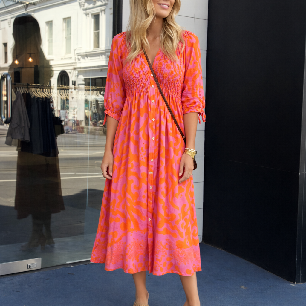 June_Elegante_Zomerse_Oranje_Midi_Jurk2.png