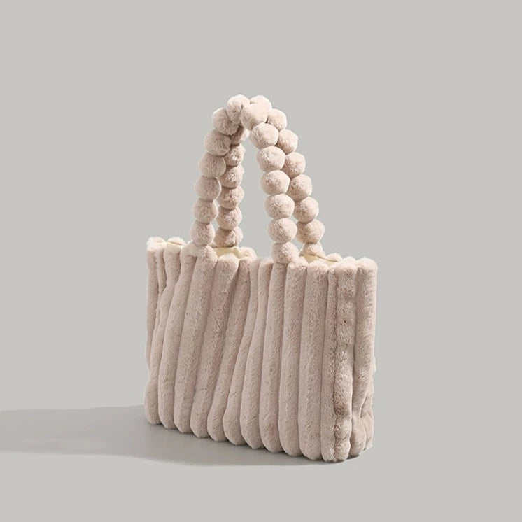 Mariana | Dames schoudertas met pluche en gevlochten handgreep