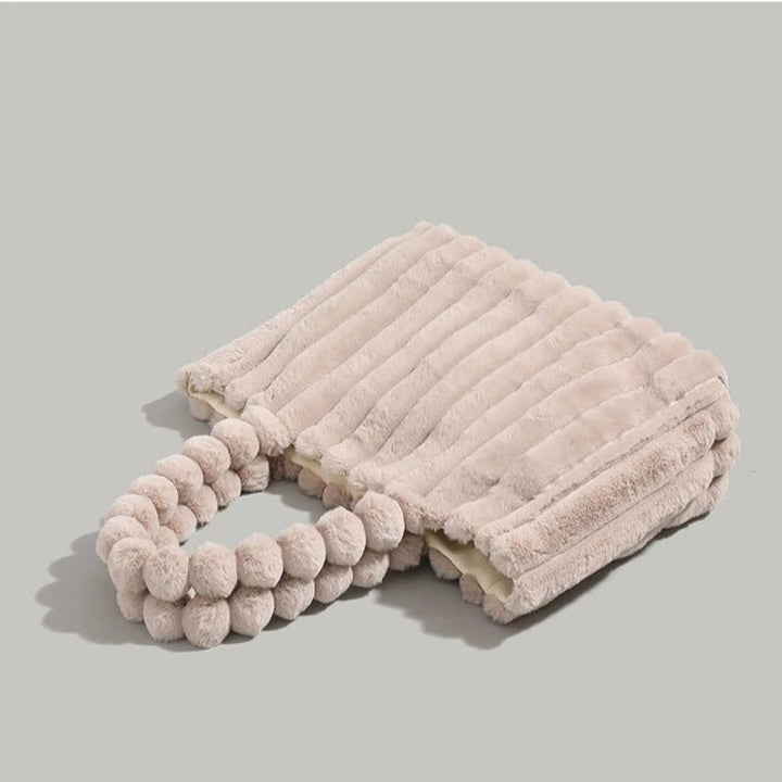 Mariana | Dames schoudertas met pluche en gevlochten handgreep