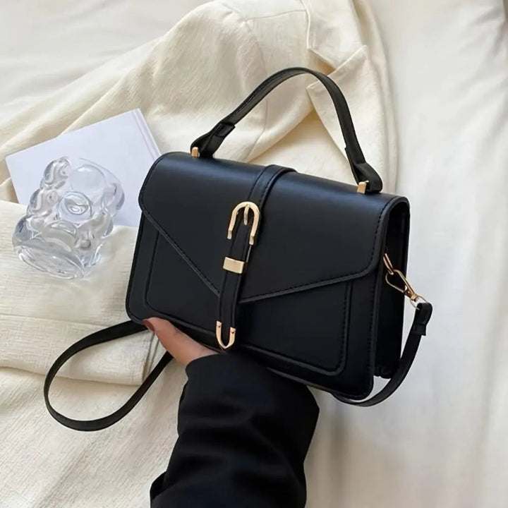 Reagan | Dames crossbody tas met gespsluiting verstelbare schouderband