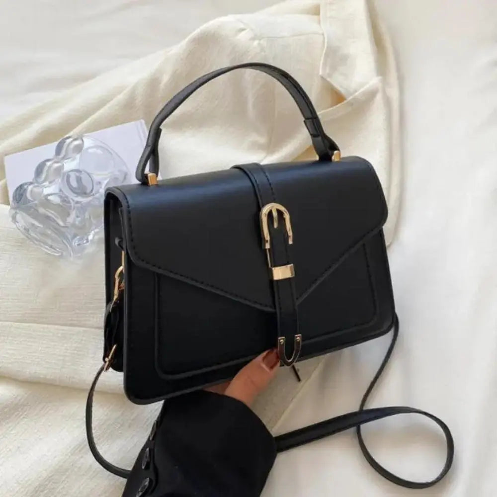 Reagan | Dames crossbody tas met gespsluiting verstelbare schouderband