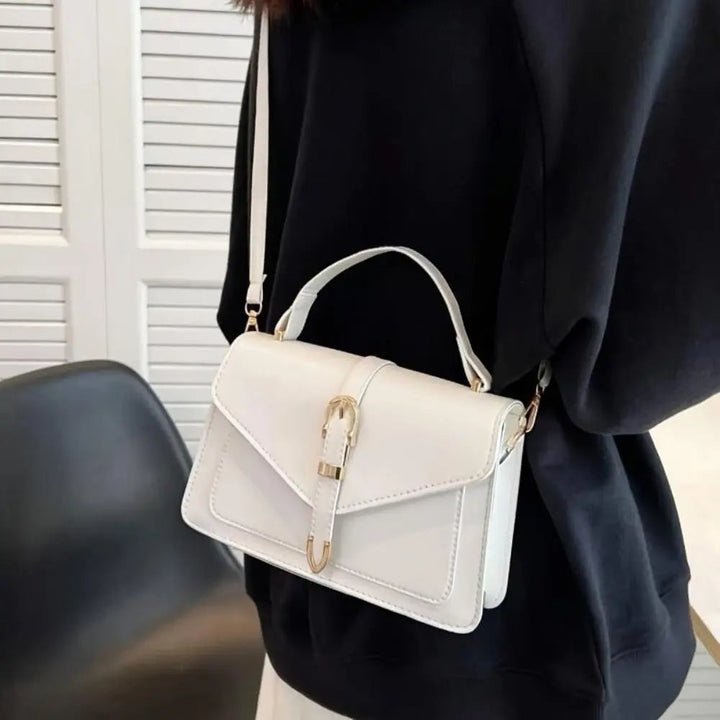 Reagan | Dames crossbody tas met gespsluiting verstelbare schouderband