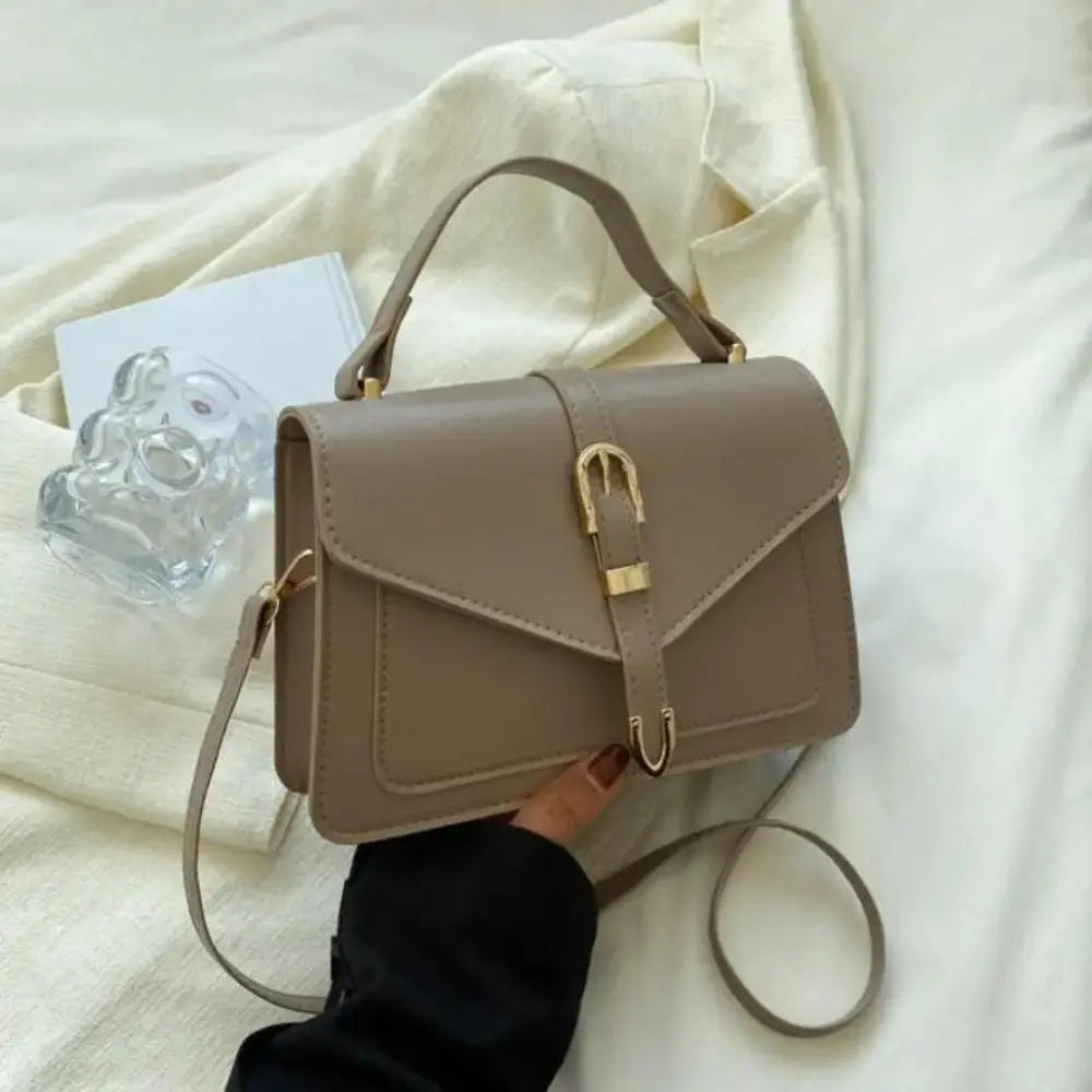 Reagan | Dames crossbody tas met gespsluiting verstelbare schouderband