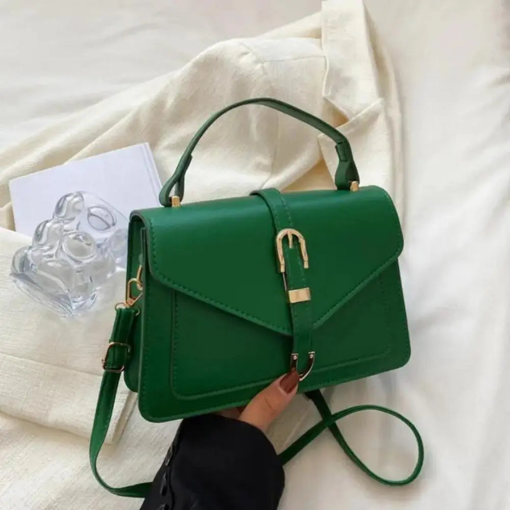 Reagan | Dames crossbody tas met gespsluiting verstelbare schouderband