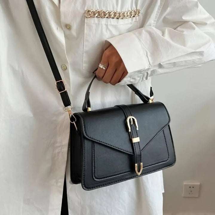 Reagan | Dames crossbody tas met gespsluiting verstelbare schouderband