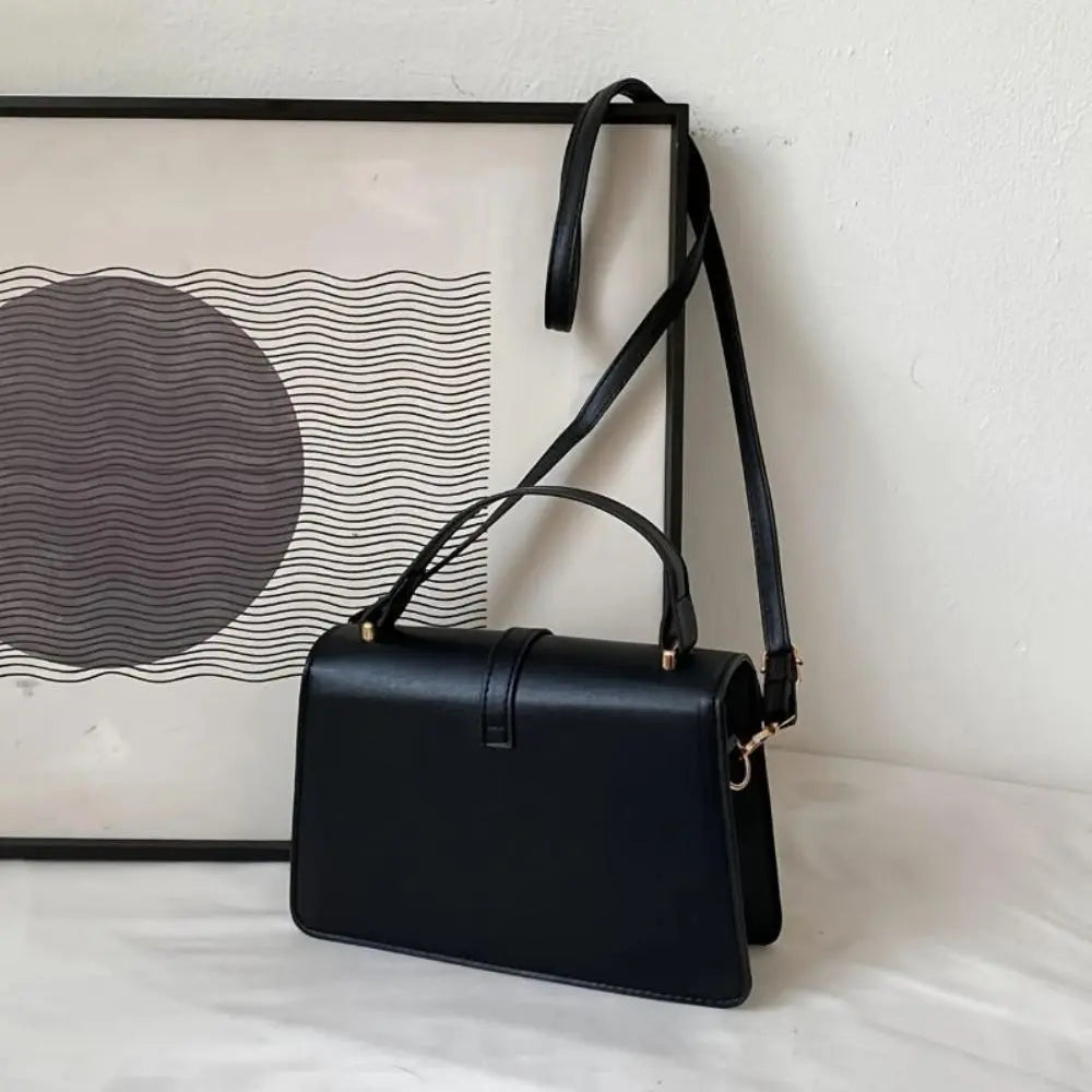 Reagan | Dames crossbody tas met gespsluiting verstelbare schouderband