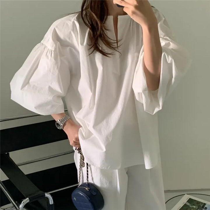 Erin | Damesblouse met split-hals en ballonmouwen