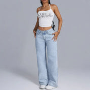 Dahna | Denim Jeans met Wijde Pijpen en Roze Strikdetails