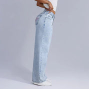 Dahna | Denim Jeans met Wijde Pijpen en Roze Strikdetails