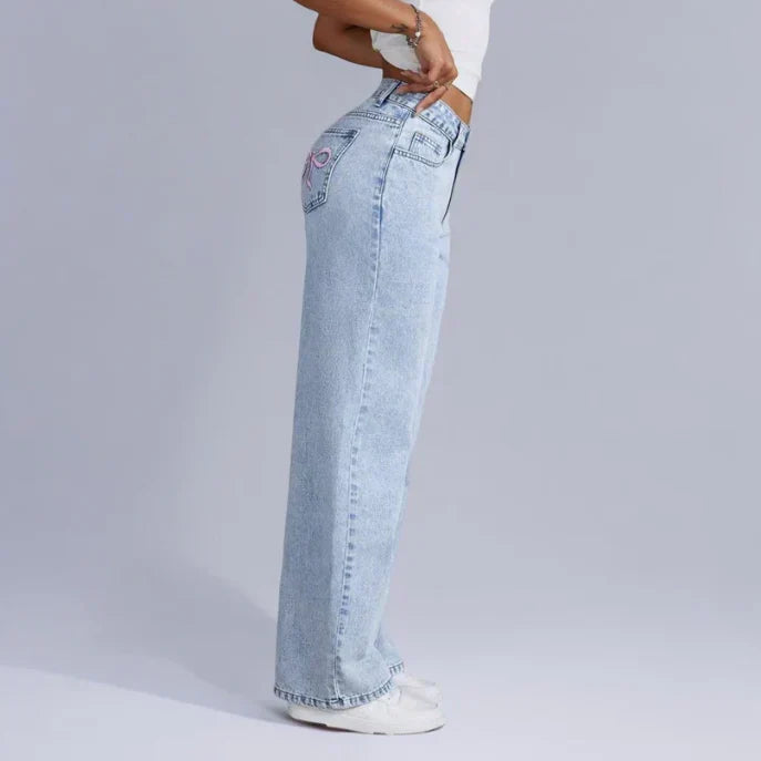 Dahna | Denim Jeans met Wijde Pijpen en Roze Strikdetails