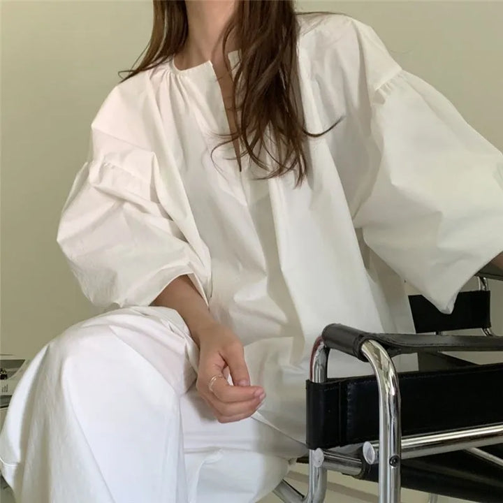 Erin | Damesblouse met split-hals en ballonmouwen