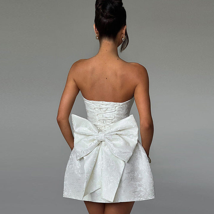 Rachel | Dames mini jurk met strapless en strikdetail