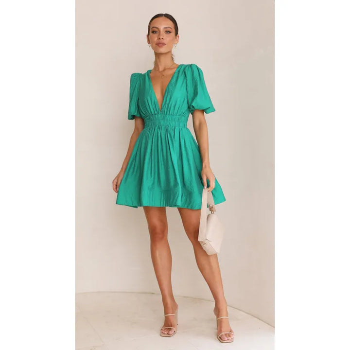 Sara | Dames Mini Jurk met V-hals en pofmouwen