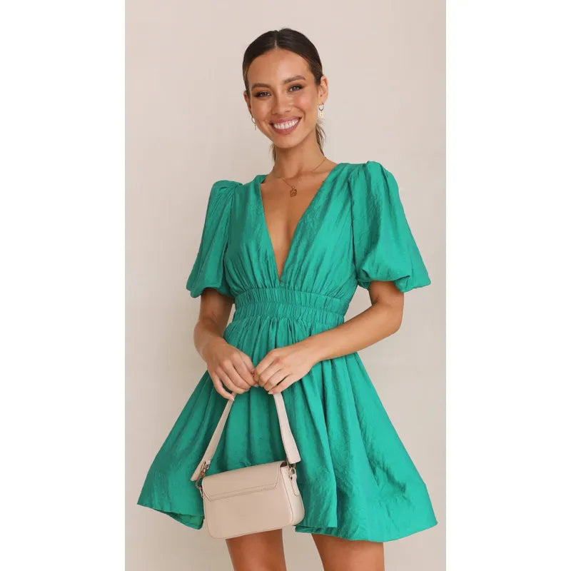 Sara | Dames Mini Jurk met V-hals en pofmouwen