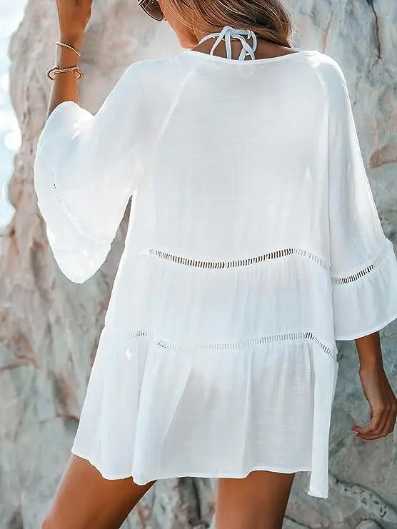 Kayla | Dames strandjurk met kantdetails en lange mouwen