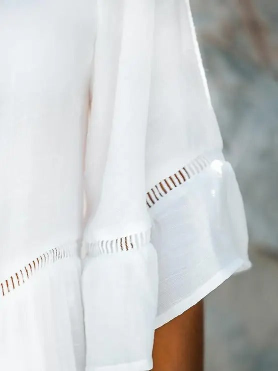 Kayla | Dames strandjurk met kantdetails en lange mouwen