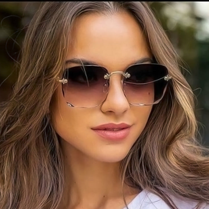 Eleanor | Dames zonnebril met randloze glazen en neuspads