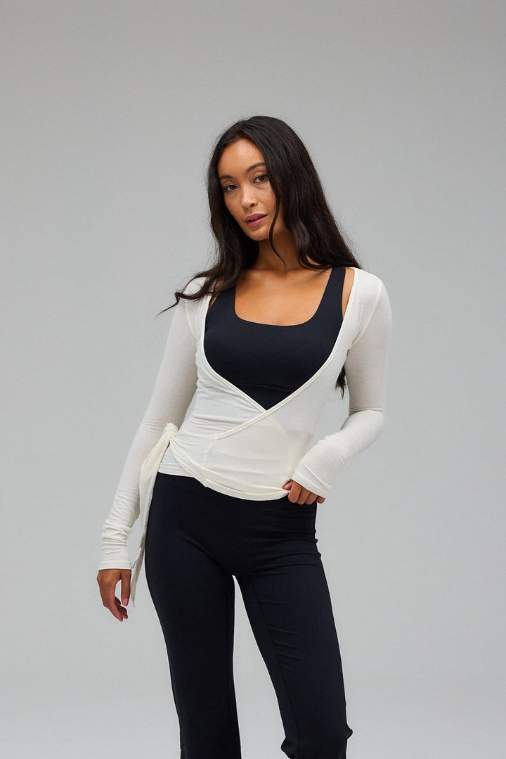 Zuri | Dames top wikkelmodel met strikdetail lange mouwen