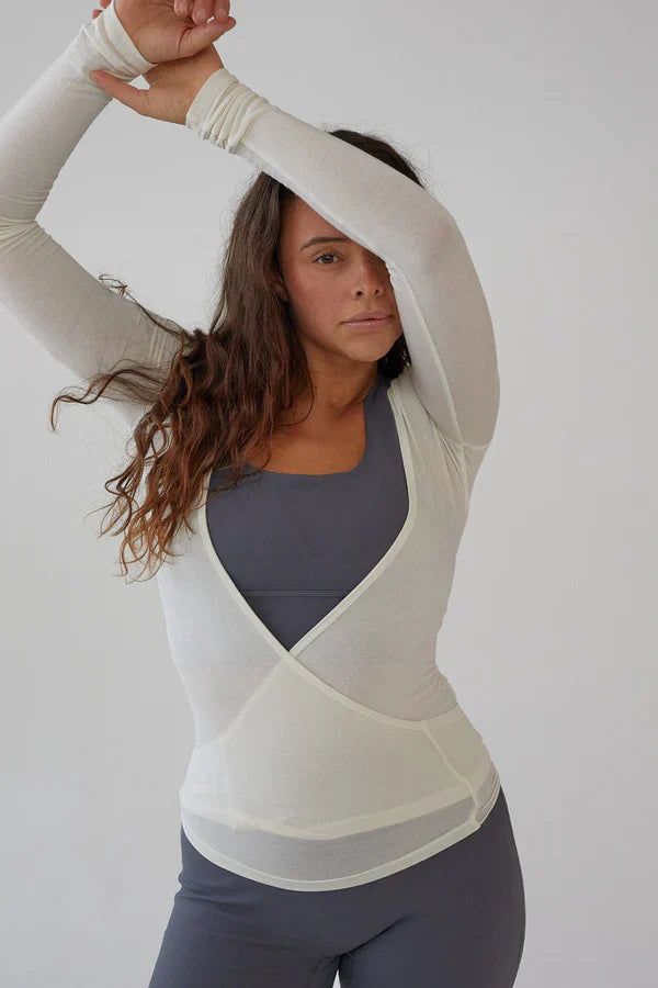 Zuri | Dames top wikkelmodel met strikdetail lange mouwen
