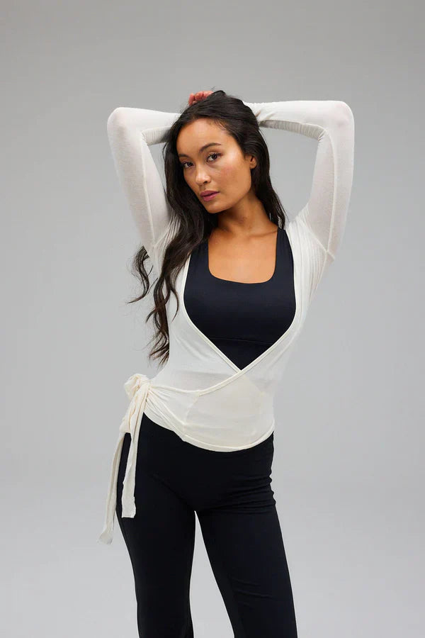 Zuri | Dames top wikkelmodel met strikdetail lange mouwen