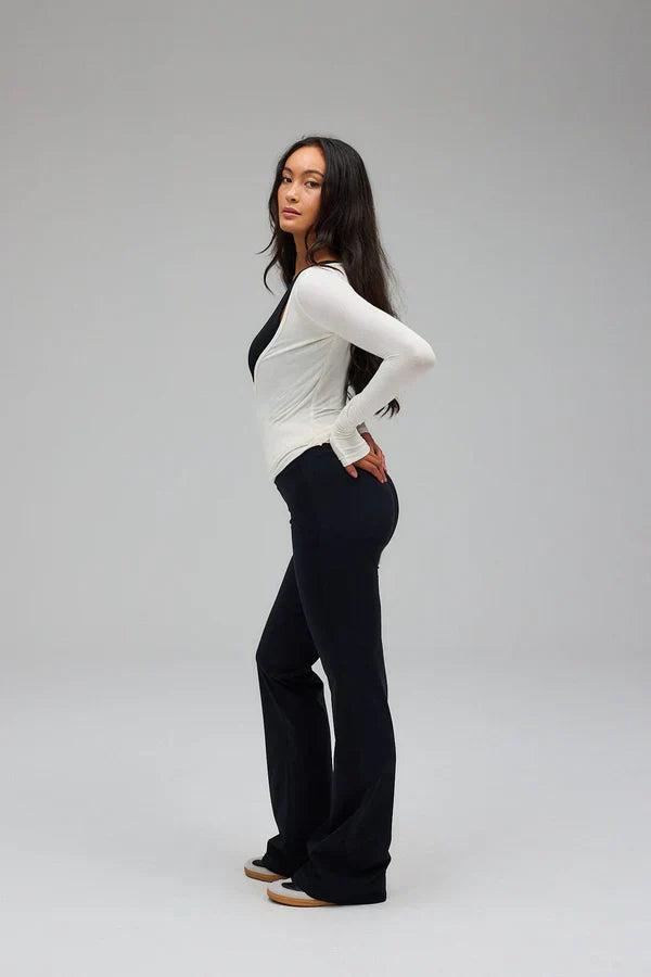 Zuri | Dames top wikkelmodel met strikdetail lange mouwen