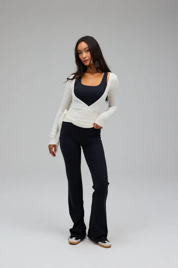 Zuri | Dames top wikkelmodel met strikdetail lange mouwen