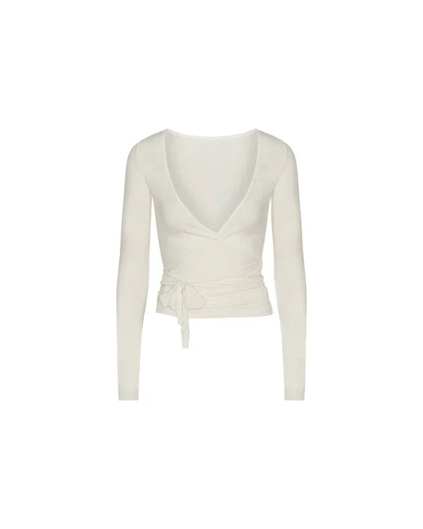 Zuri | Dames top wikkelmodel met strikdetail lange mouwen