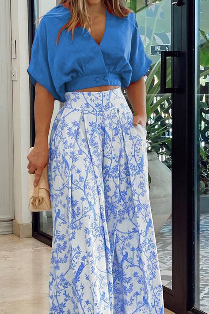 Kallie | Dames set top broek wikkel hals bloemenprint